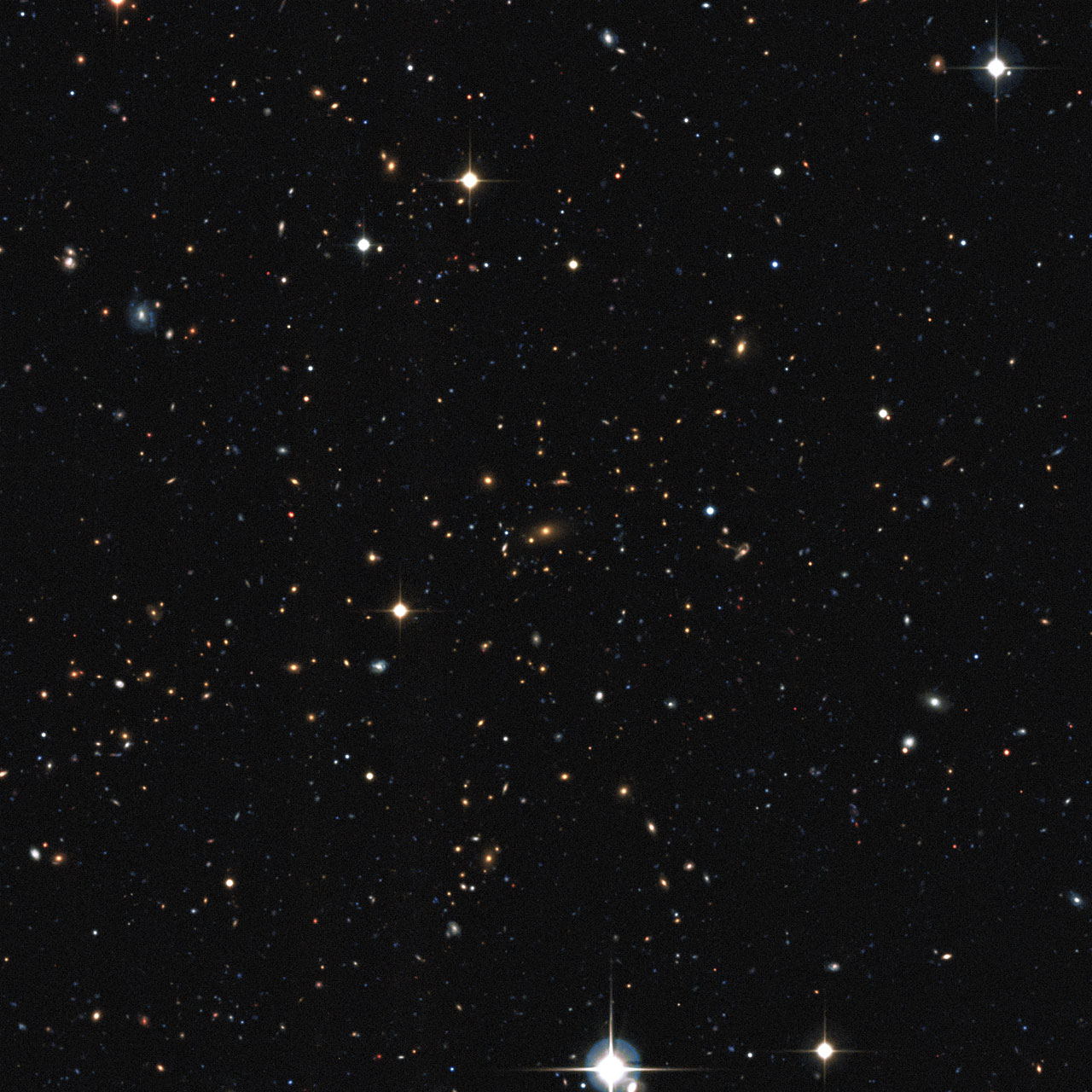 Visible light view of a distant galaxy cluster discovered in the