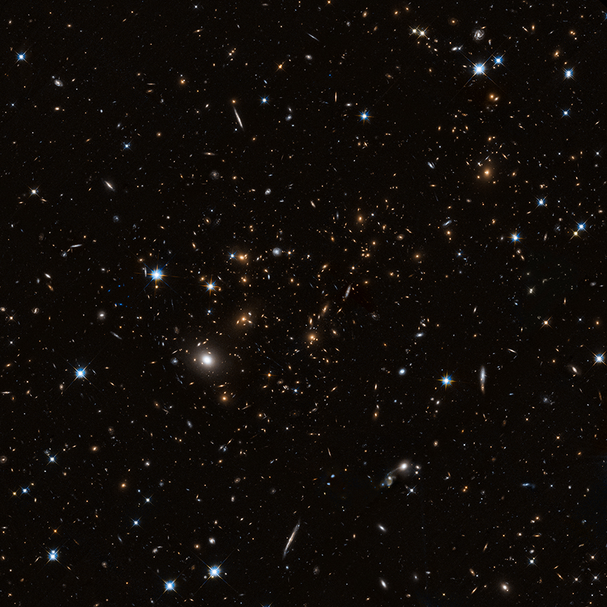 Two galaxy clusters located about 4.3 billion and 5.4 billion light years away respectively.
